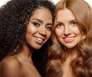 Beauty High fashion models. Beautiful tanned vogue girls, trendy makeup. Different ethnicity Women faces on withe background. Gorgeous Multi-ethnic fashionable ladys. Caucasian and African on white